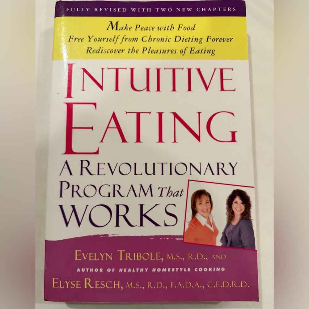 Intuitive Eating: A Revolutionary Program That Works - White and Purple Cover
